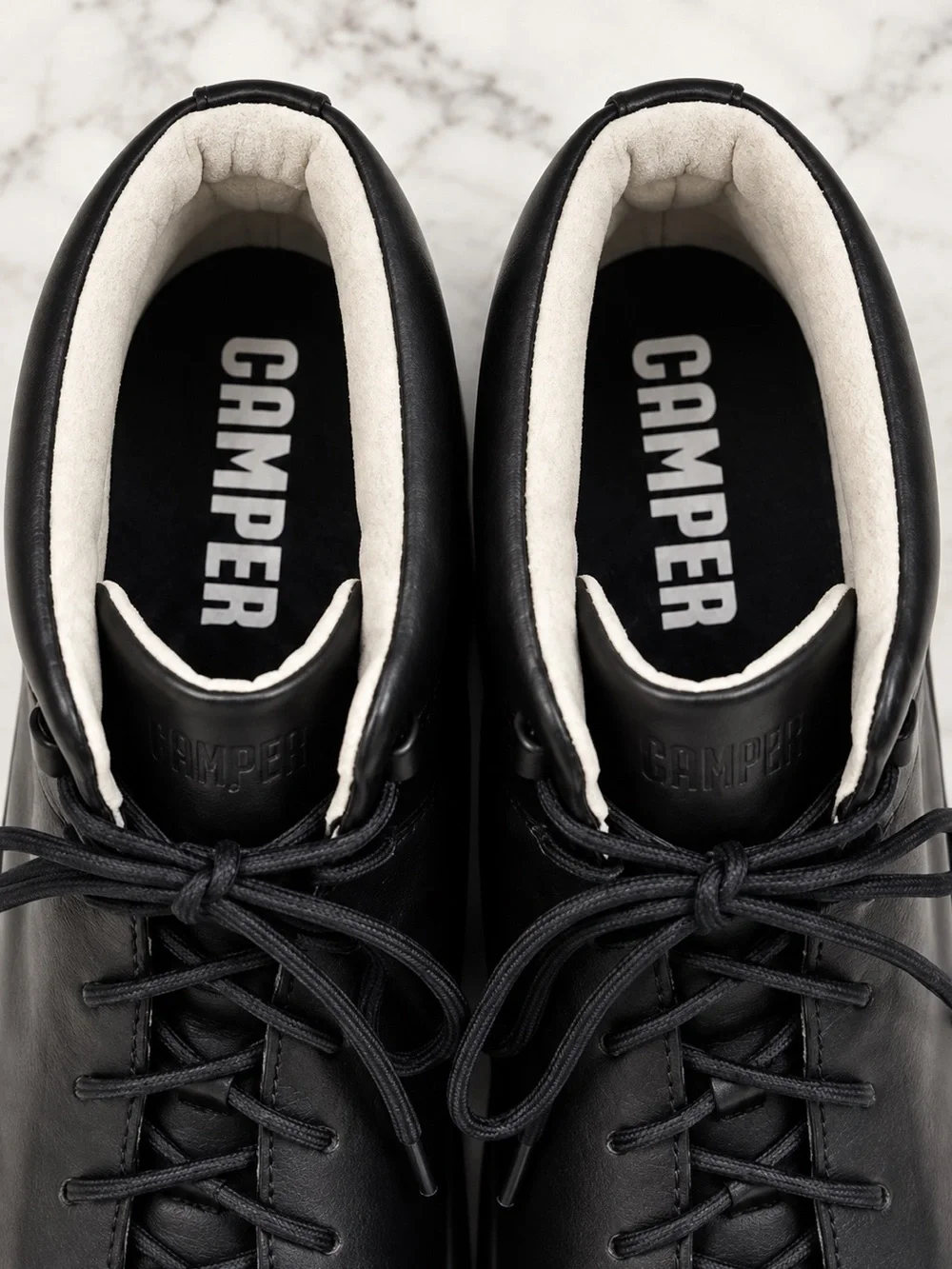 Camper Chasis men’s high-top sneakers / ankle boots in classic black leather.